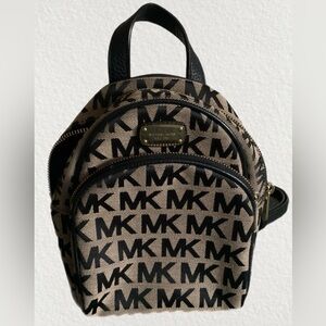 Brand new Michael Kors Extra Small backpack